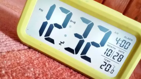 Couple Find Spy Camera 'Hidden In Digital Clock' Pointed At Bed In Airbnb