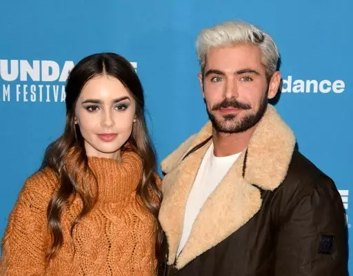 Efron stunned everyone with his platinum blonde locks. Here he is pictured with on-screen girlfriend Lily Collins.