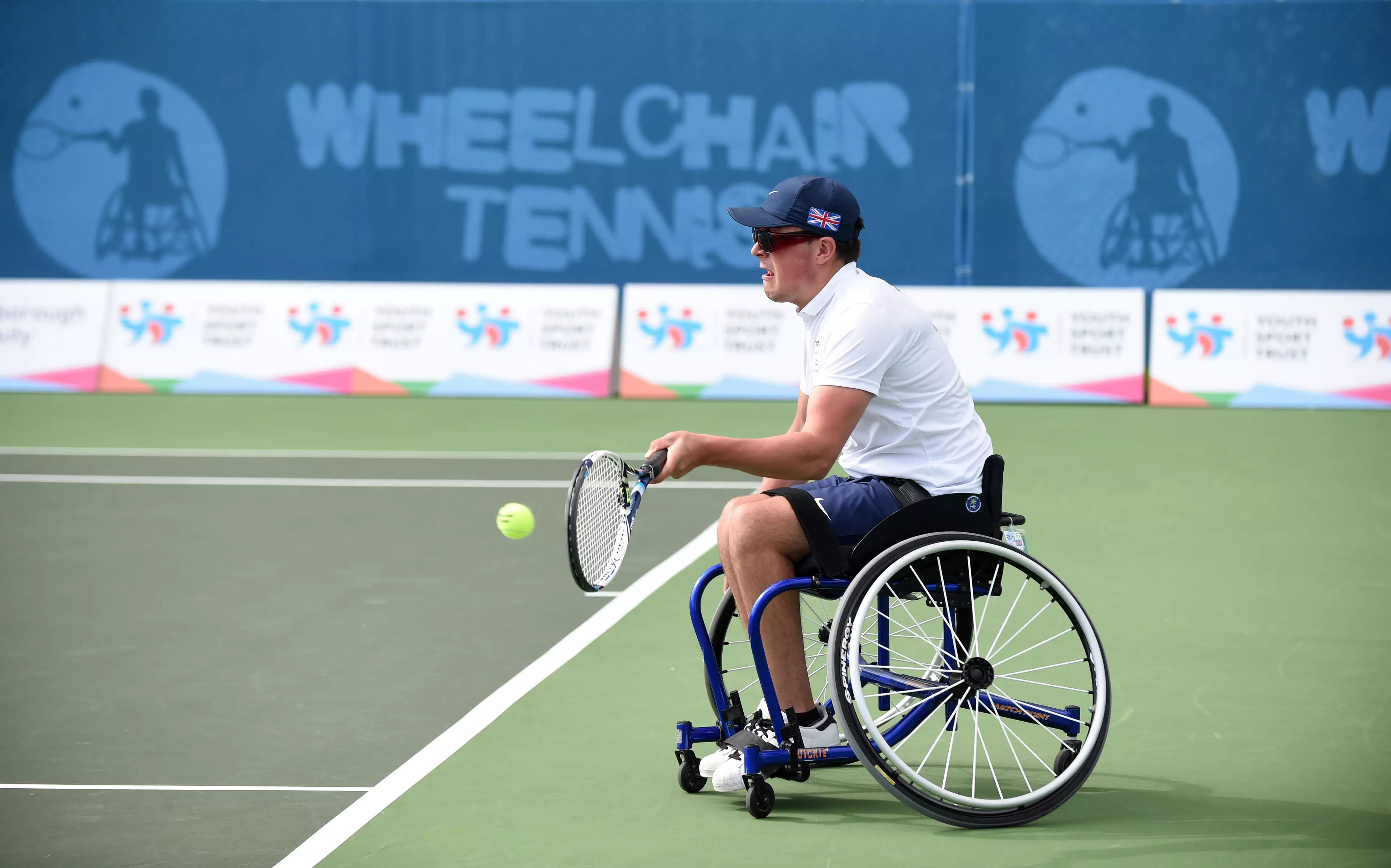 Wheelchair tennis is hard enough without a slope.