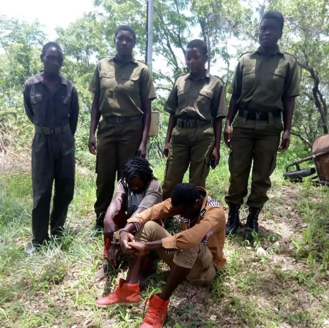 Some of the rangers just after arresting two men accused of poaching.