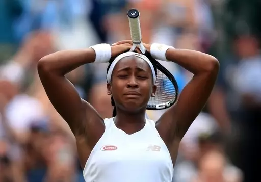 Cori Gauff celebrates her win against Venus Williams on day one of the Wimbledon Championships.