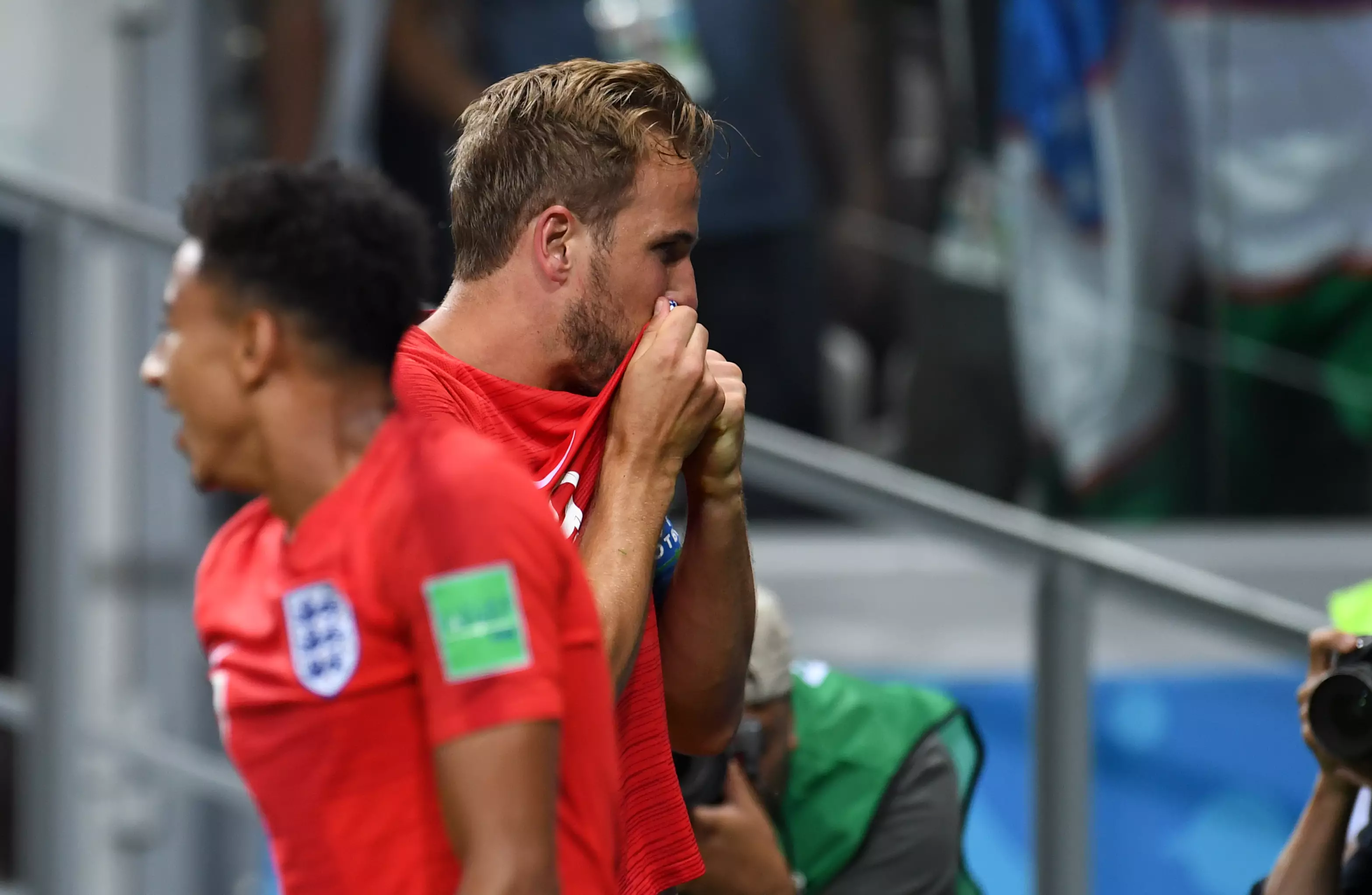 Kane kisses the badge after scoring for England. Image: PA