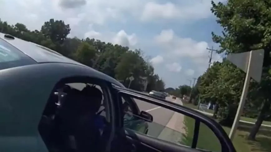 Police Respond To Viral Video Of Officer Appearing To Throw Baggie Into Car