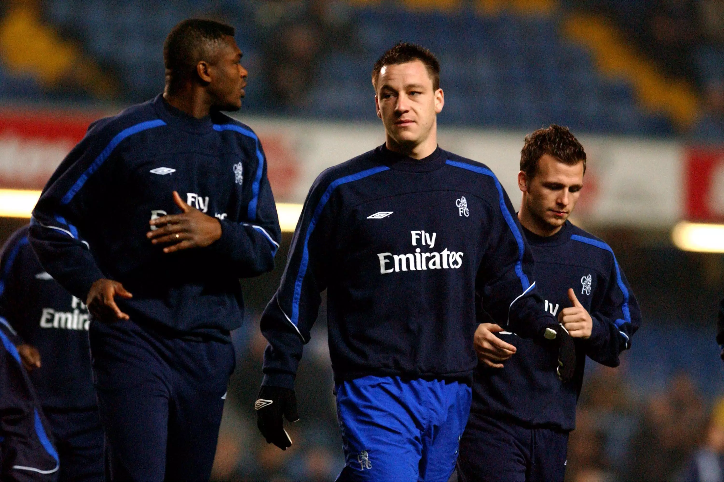 Terry with former centre back partner Marcel Desailly. (Image