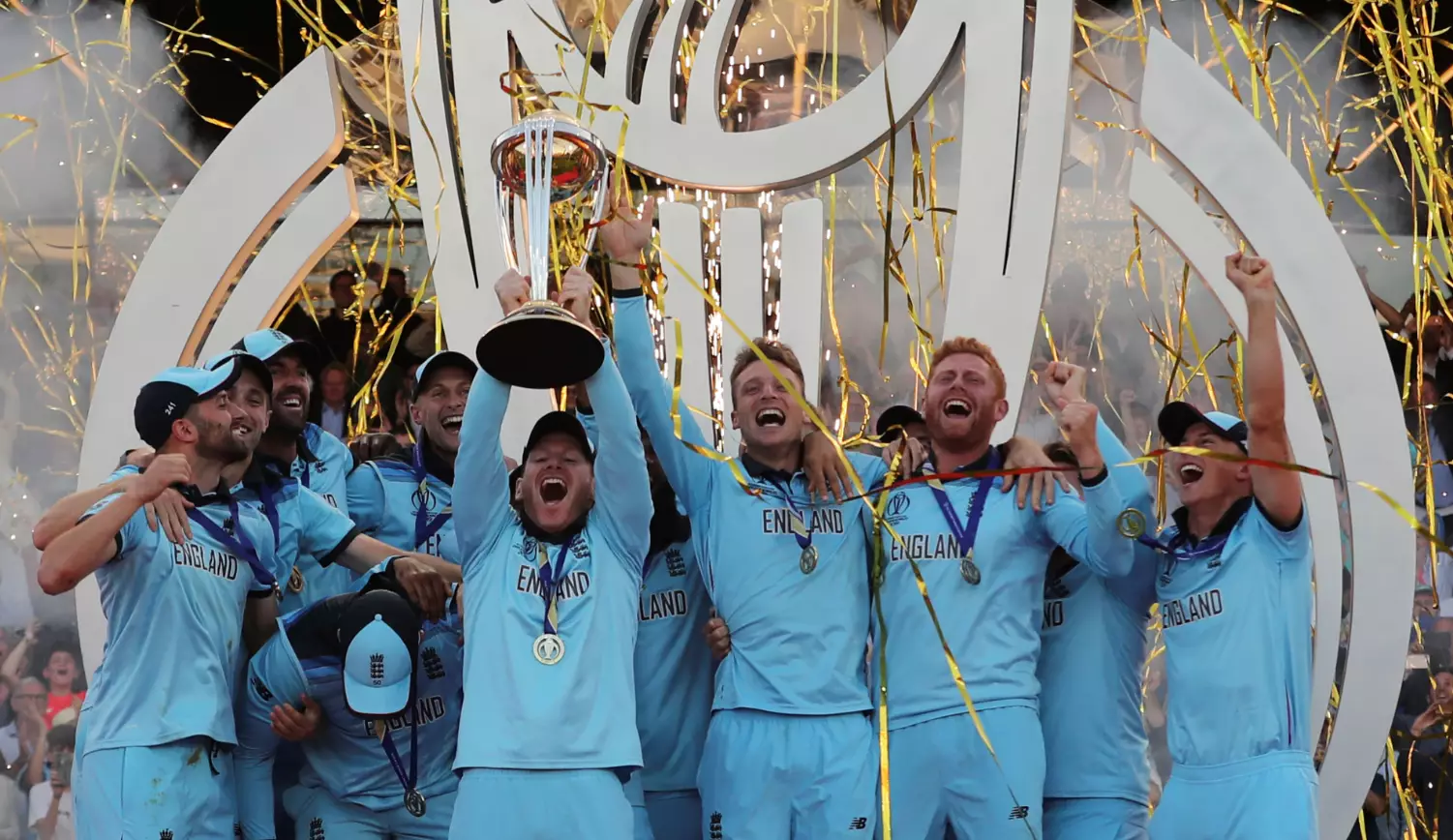 England's captain Eoin Morgan lifts the trophy after winning the Cricket World Cup final match.