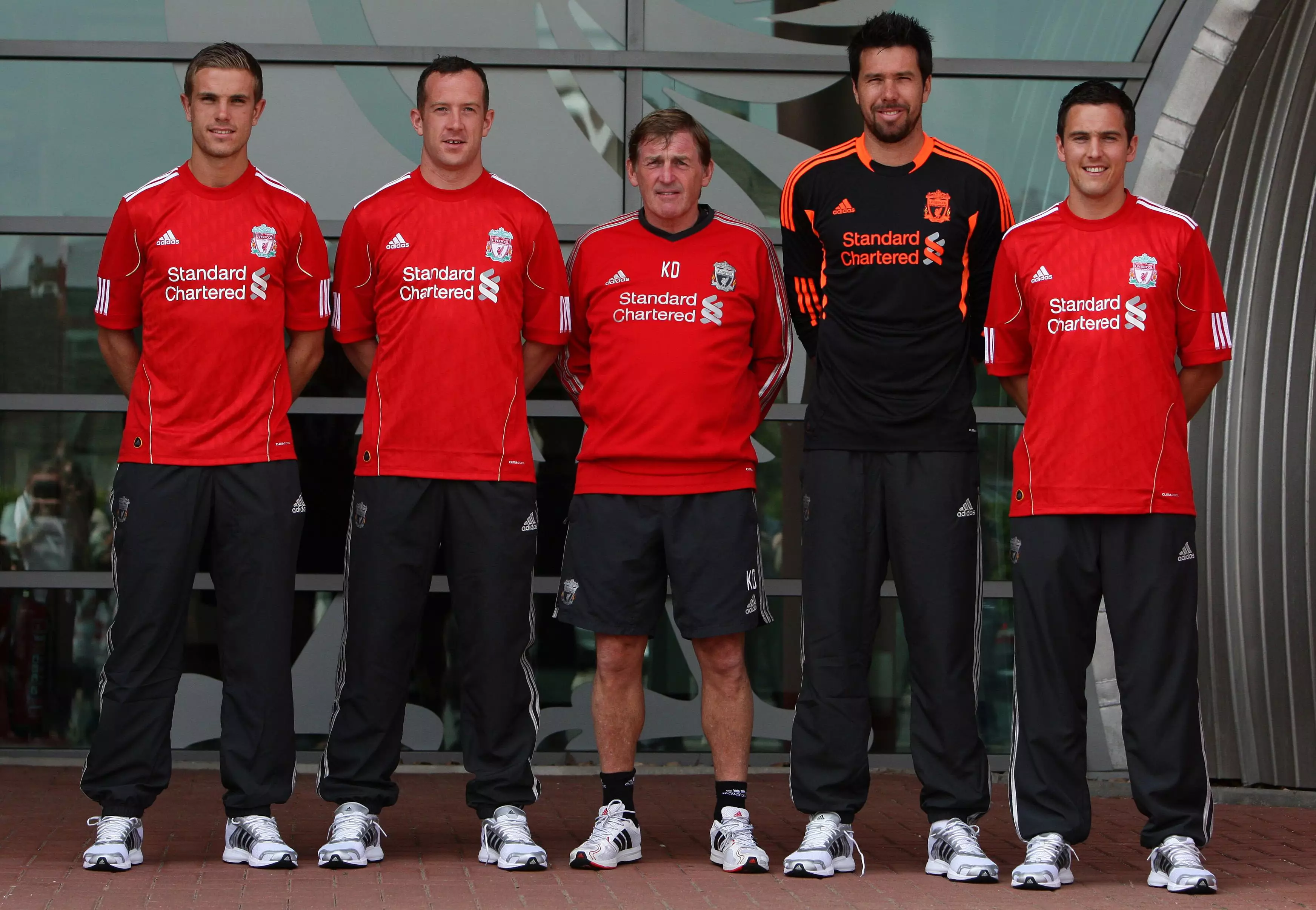 A young Henderson (Far left) poses after signing in 2011. (Image