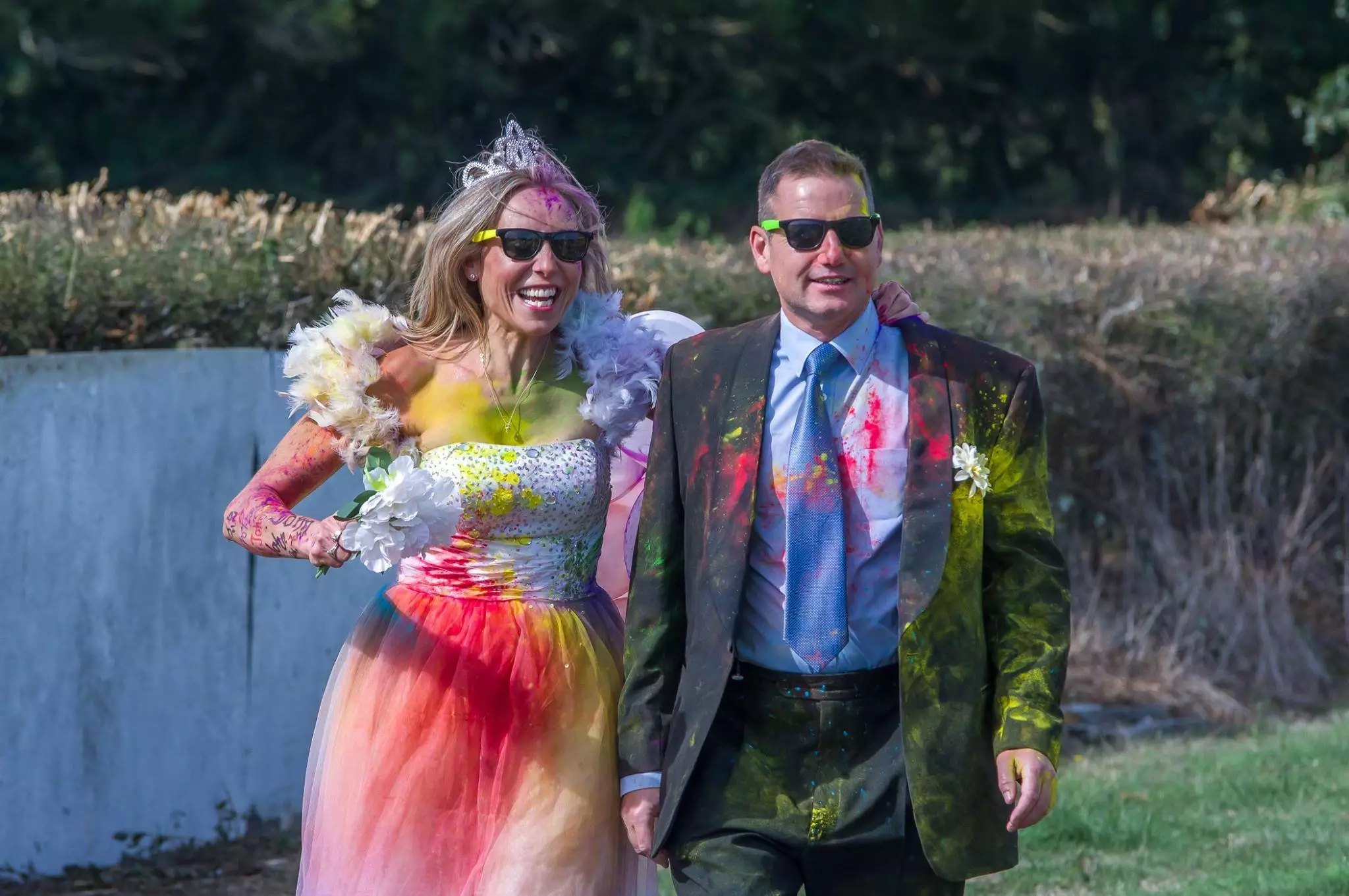 Michelle and John taking part in the Age UK colour run the day after their wedding.