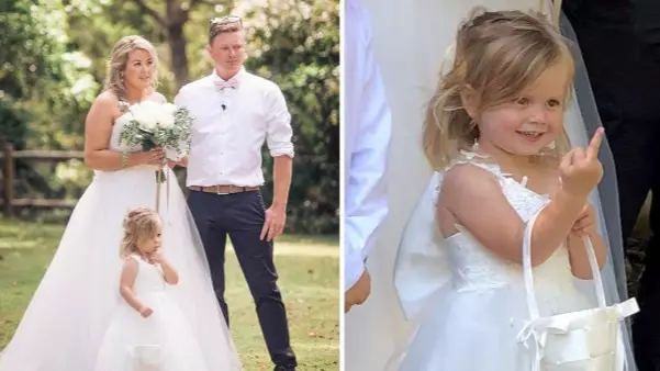 Little Girl Photobombs Mum's Wedding Pictures In The Cutest Way