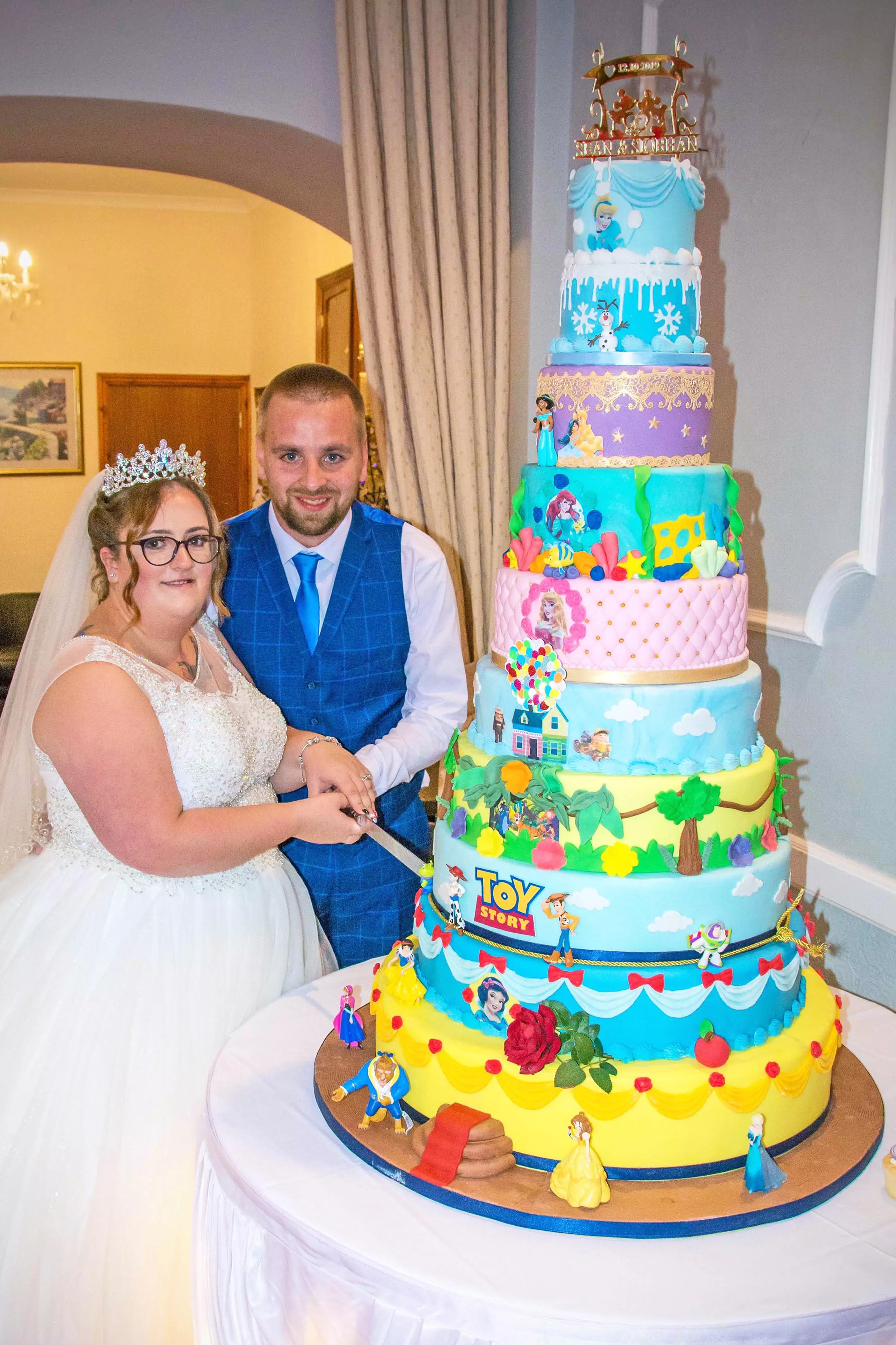 The cake's ten tiers matched their table names. (