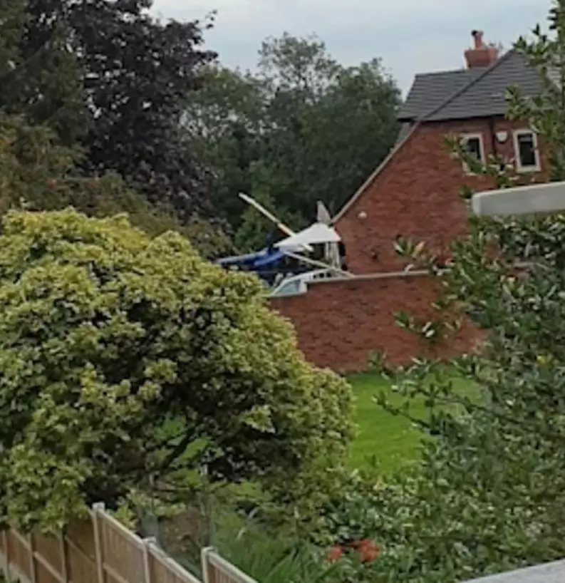 The chopper flipped onto its side shorty after taking off from a back garden.