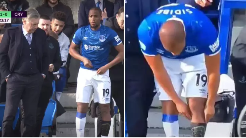 Djibril Sidibe Goes To Pull His Sock Up, Only To Realise His Sock Isn't On