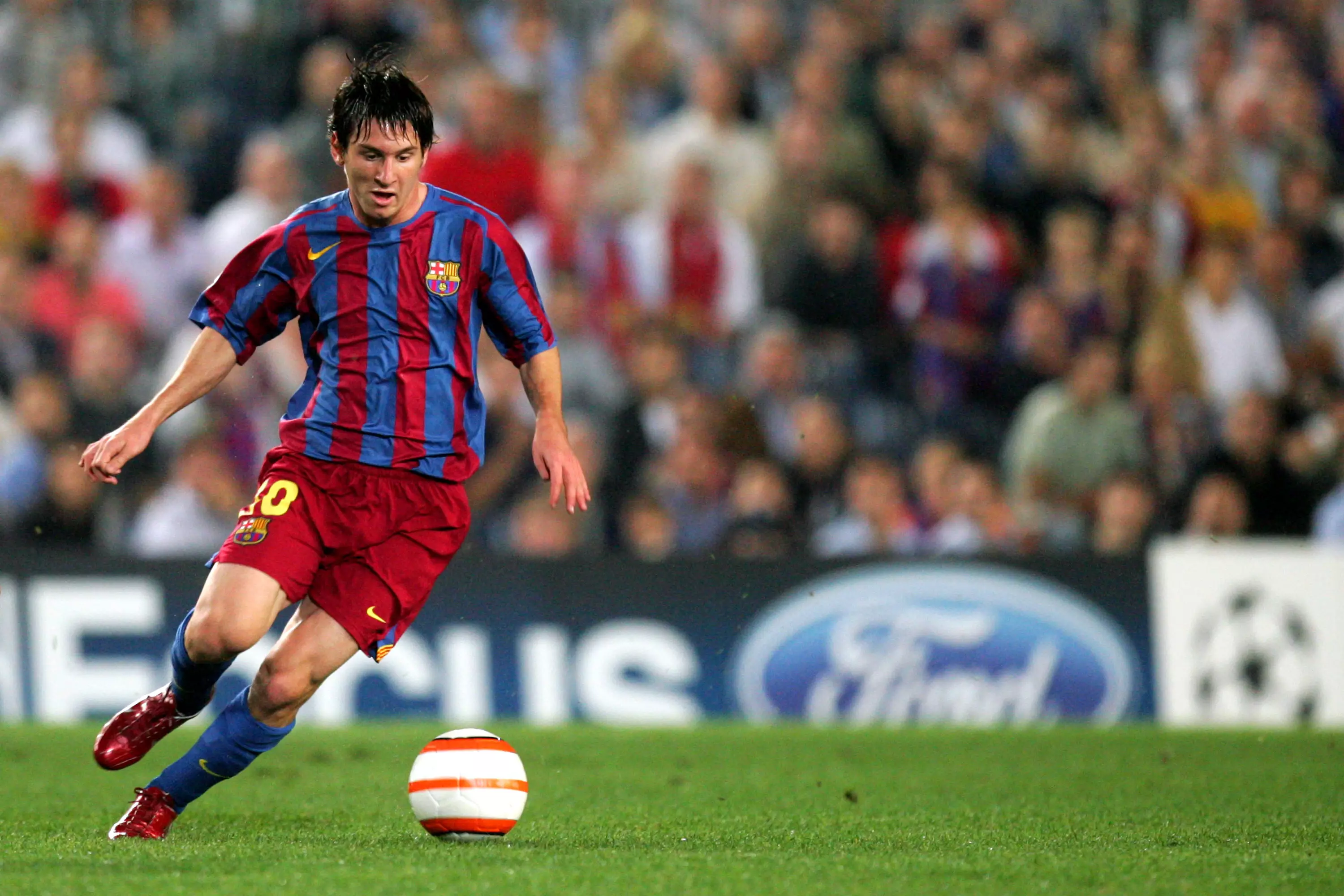 Messi's early days at Barcelona. Image: PA