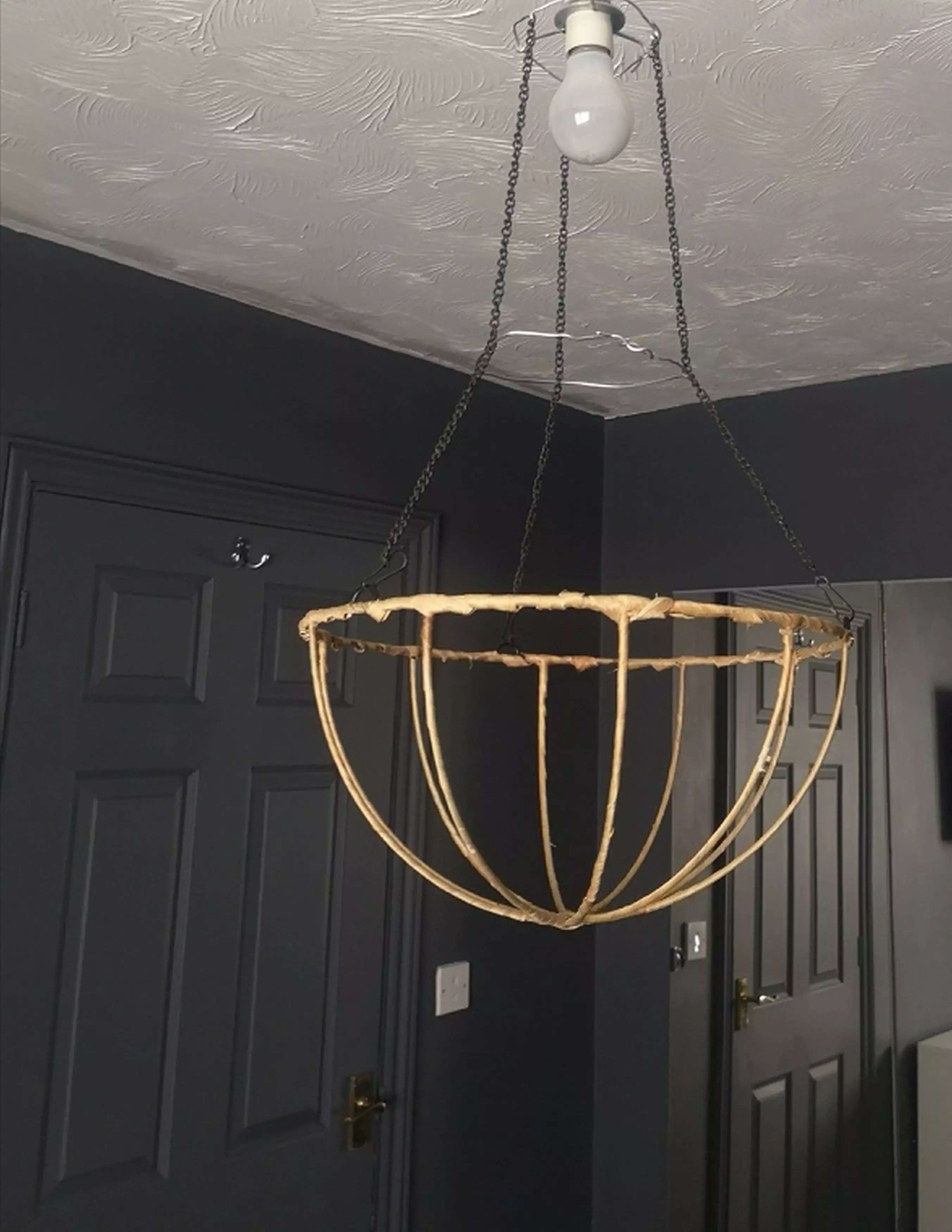 She began by creating a wire frame for her light fitting (