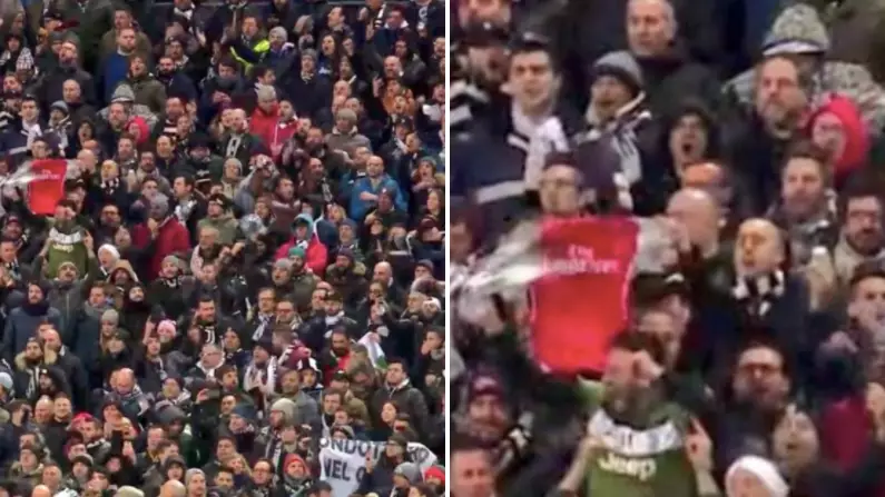 A Juventus Fan Spotted Trolling 80,000 Tottenham Supporters By Pointing At Arsenal Shirt 