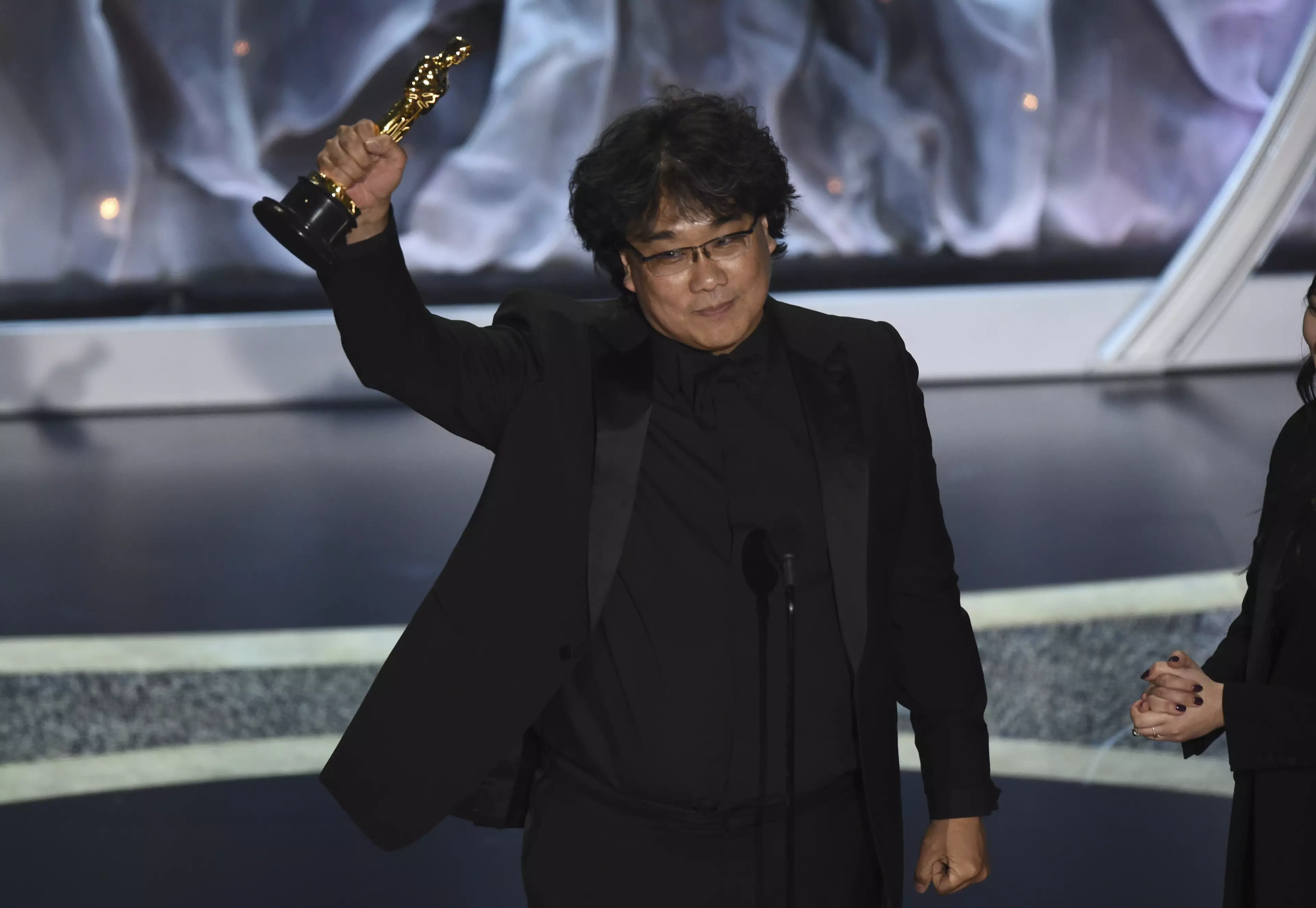 Bong Joon-ho collected his award for Best Director.
