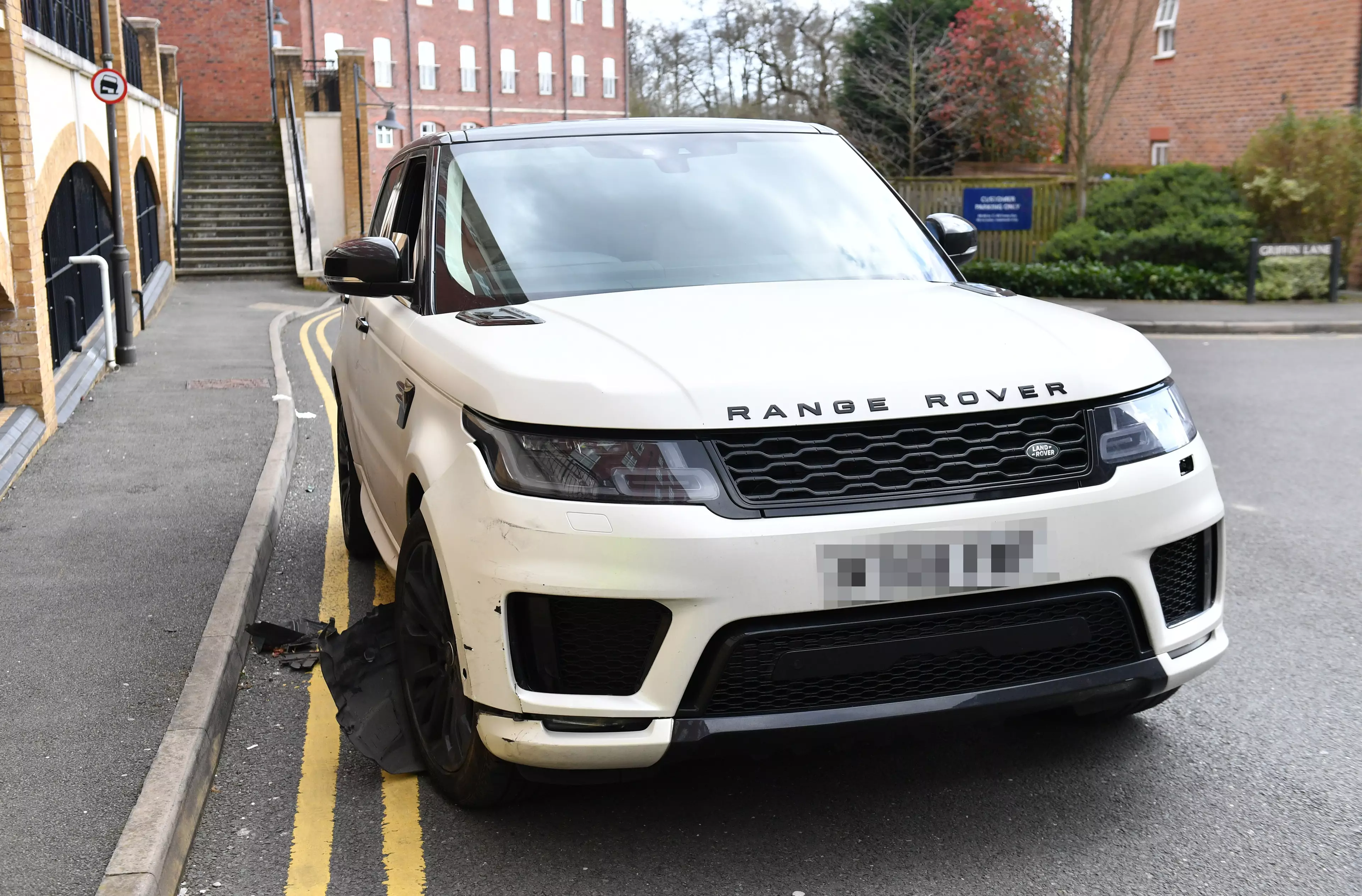 A damaged white Range Rover after reports of a crash with parked cars in the Dickens Heath area of Solihull.