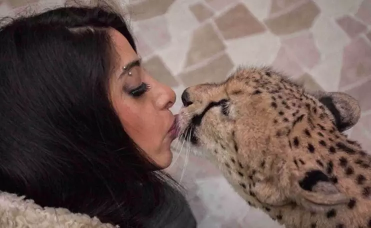 Jaber with her pet cheetah.