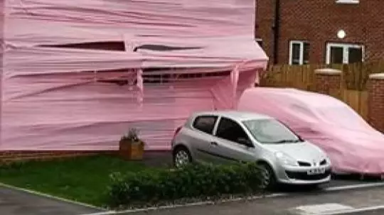Couple Returns From Honeymoon To Find Their House Wrapped In Pink Plastic