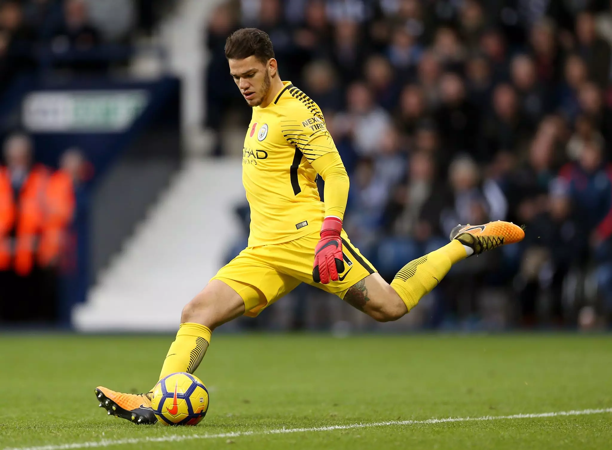 Ederson casually picking out one of his teammates. Image: PA