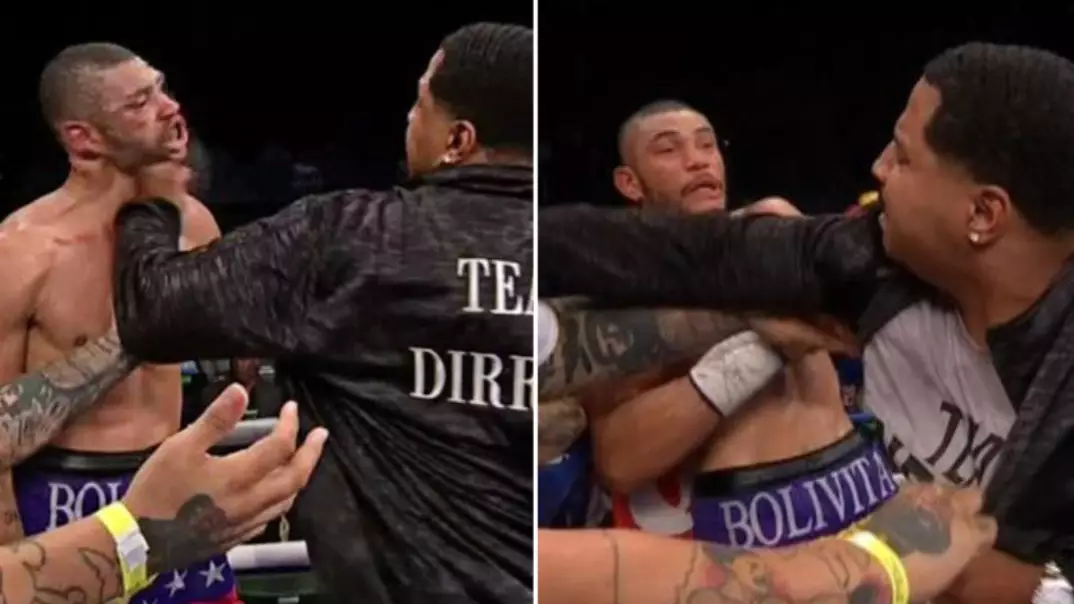 Disgusting Moment Trainer Sucker Punches Boxer At The End Of The Fight
