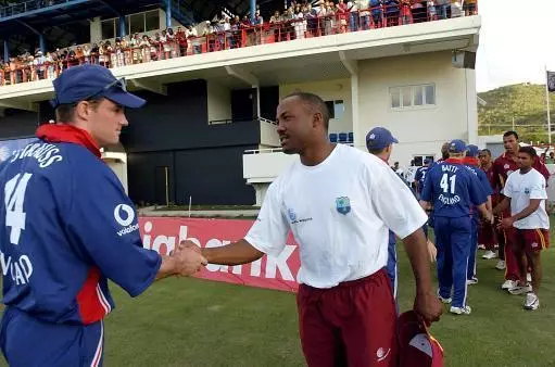 England batsman Andrew Strauss shakes hands with West Indian captain Brian Lara in 2004.