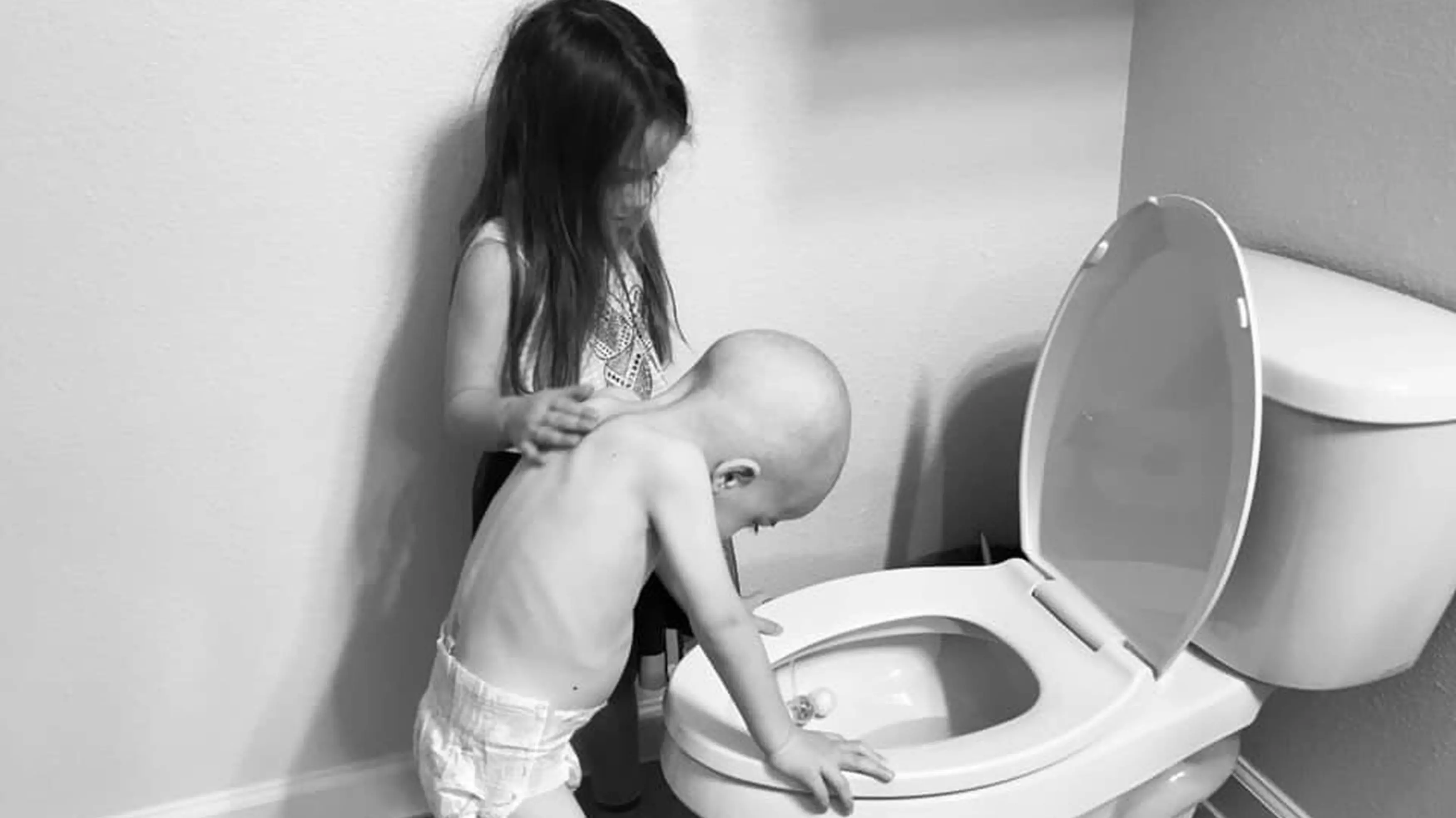 Mum’s Heartbreaking Photos Show Girl Looking After Little Brother Battling Leukaemia