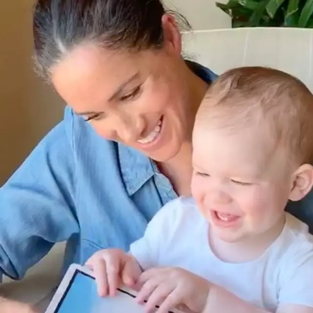 The adorable clip shows Meghan reading the book 'Duck! Rabbit!' to birthday boy Archie (