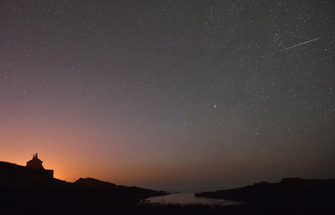 A shooting star in the skies above Northumberland from 2015's Perseids meteor shower.