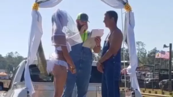 ​Bikini-Clad Bride And New Husband Frolic In Mud After Ceremony