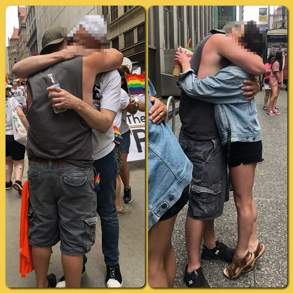 Two people receiving two hugs.