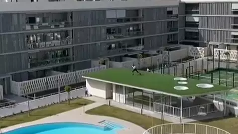 Fitness Instructor In Spain Gives Aerobics Class From Rooftop