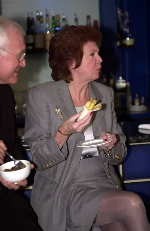 Here's the late Cilla Black eating one in 2000.