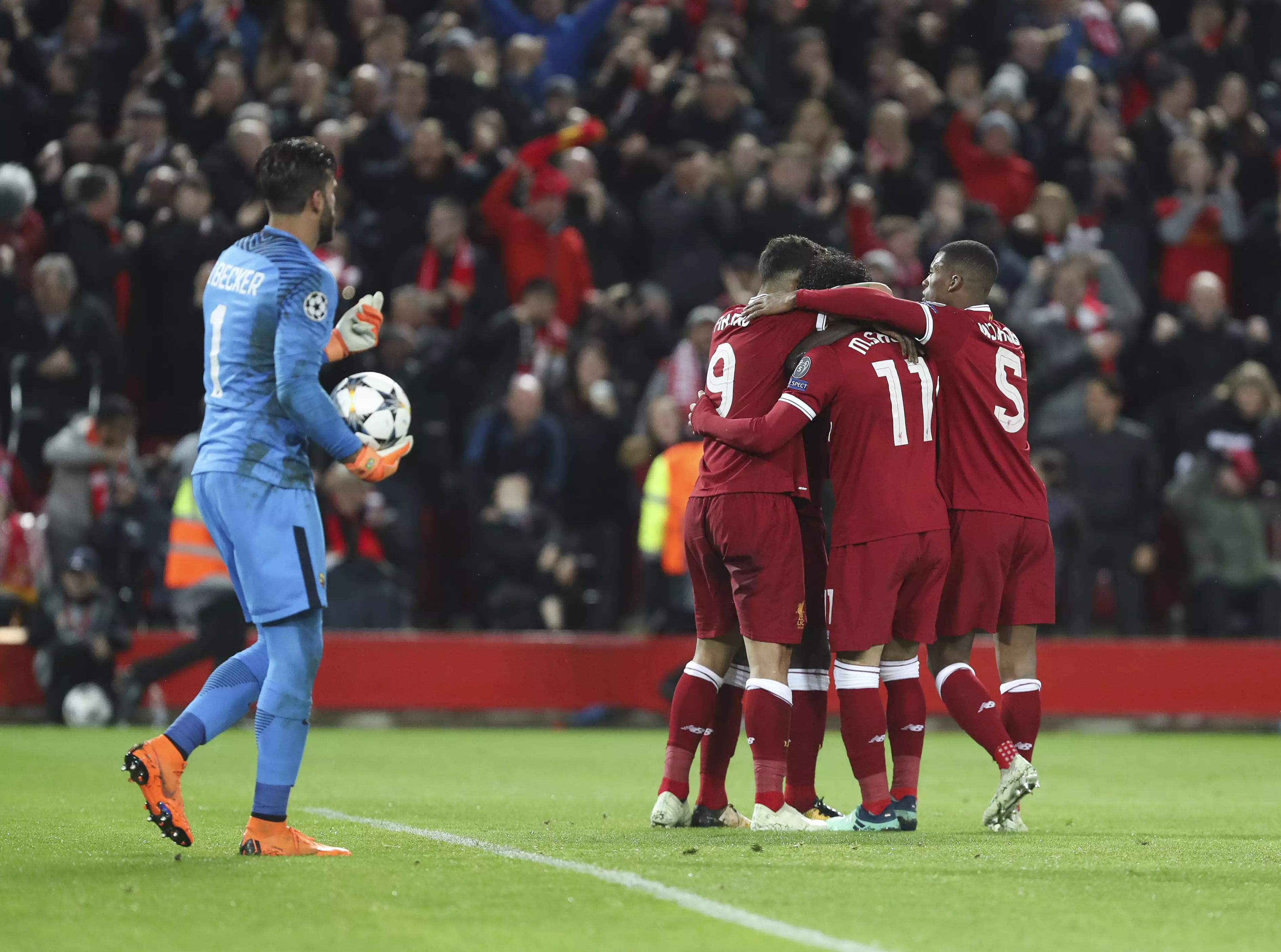 Liverpool players celebrate another goal past Roma. Image: PA Images