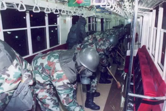 Ground Self-Defense Forces clean up subway cars in Tokyo, 1995.