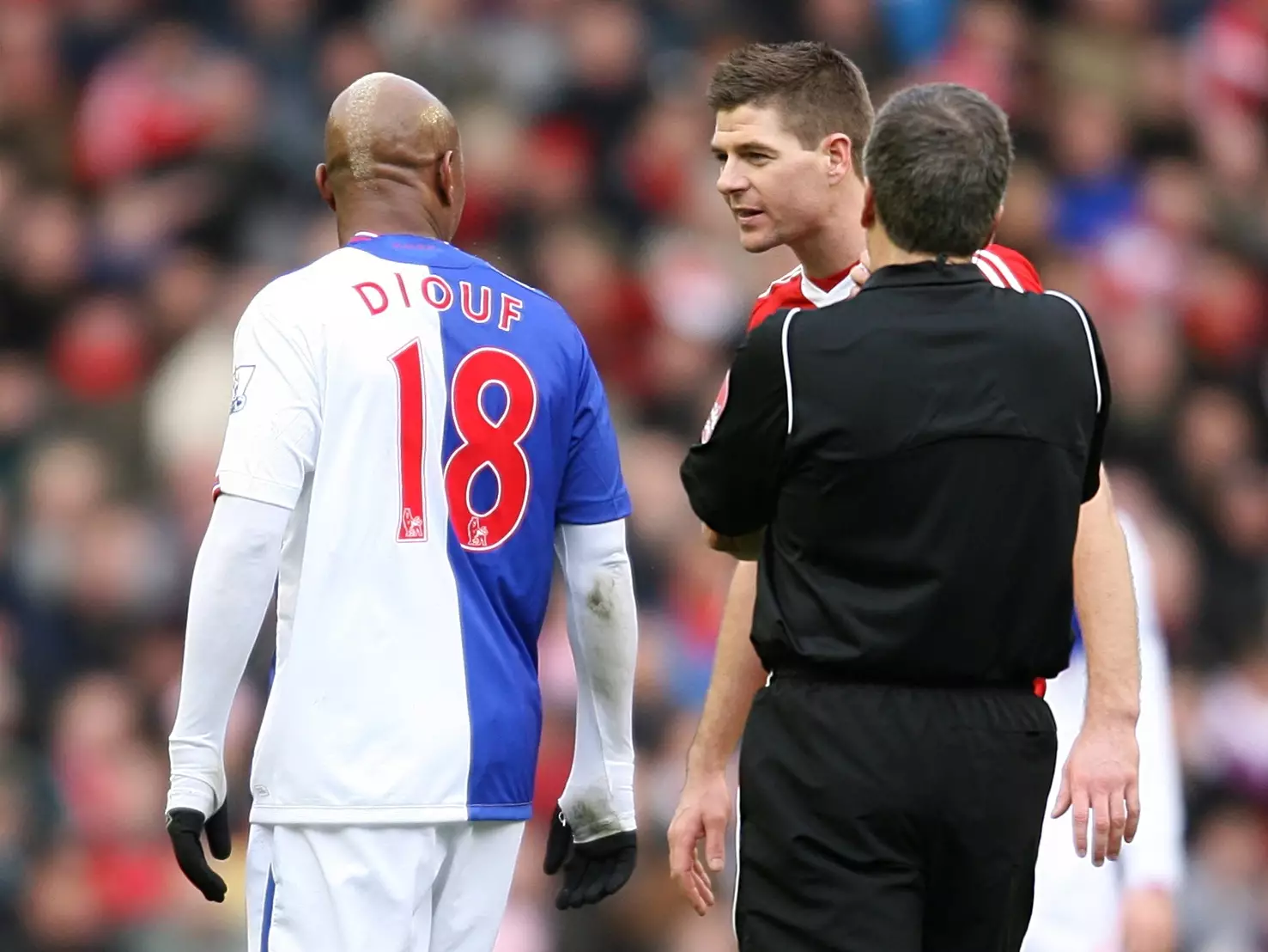Fair to say Diouf and Gerrard aren't on each other's Christmas card lists. Image: PA Images