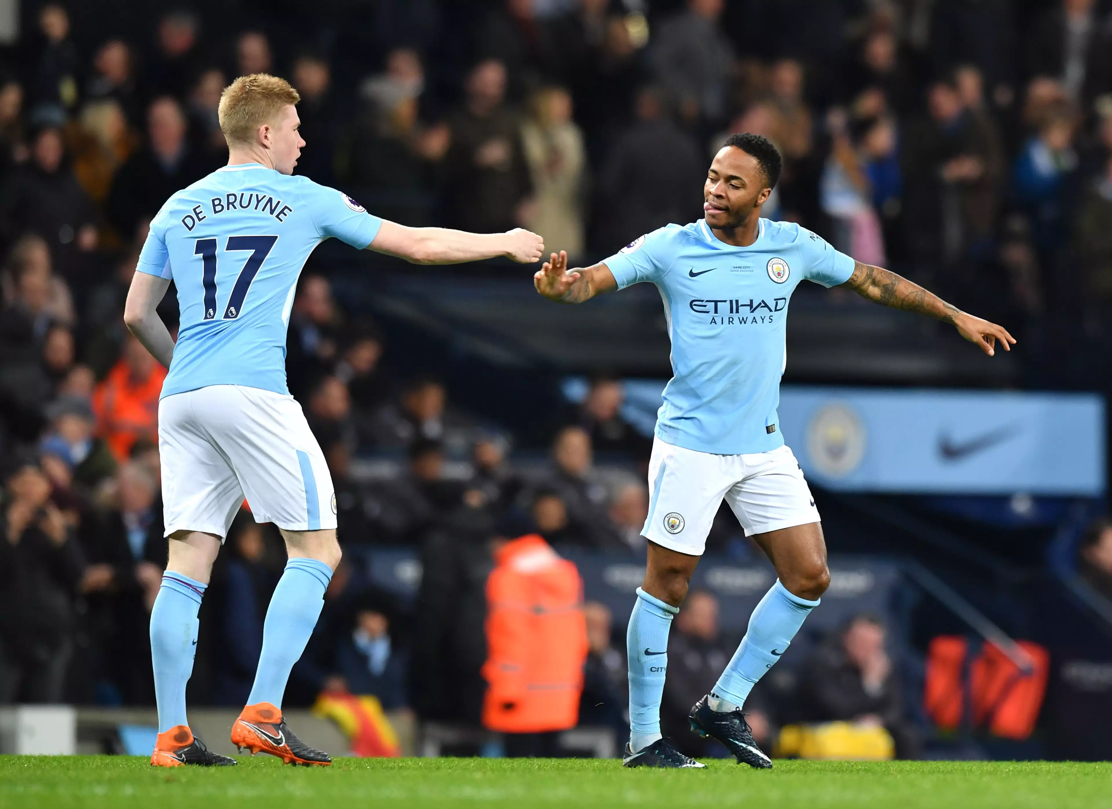 De Bruyne celebrates with Sterling. Image: PA
