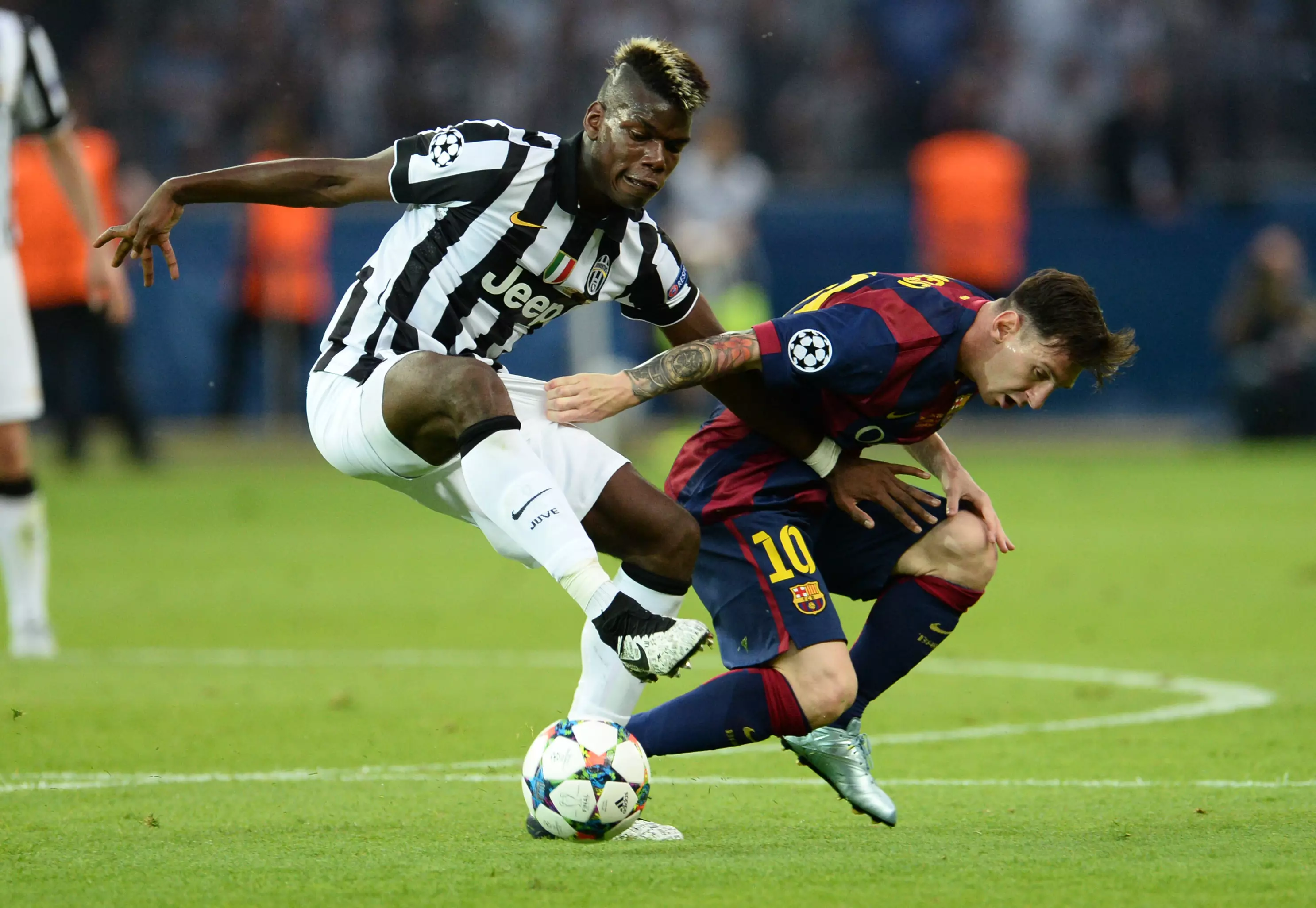 Pogba battles with Messi in the Champions League final. Image: PA Images
