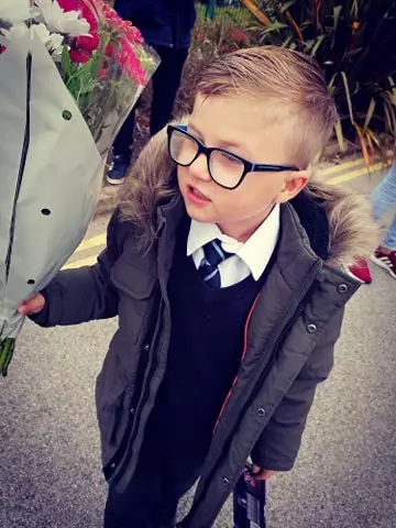 Harley waited for his girlfriend at the school gates, but she was late so he made his mum promise to return after school with the gifts (