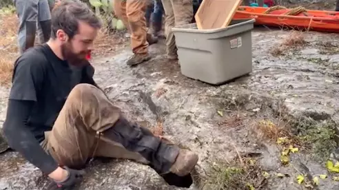 People Are Horrified At Watching A Caver Squeeze Through A Tiny Hole