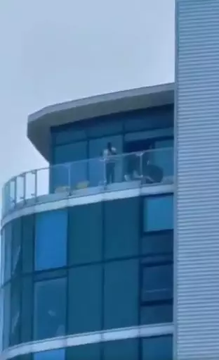 Footage filmed by a witness showed the gunman on the balcony.