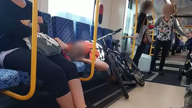 Cyclist Sleeps Across Four Seats Meaning Mum And Baby Can't Use Them