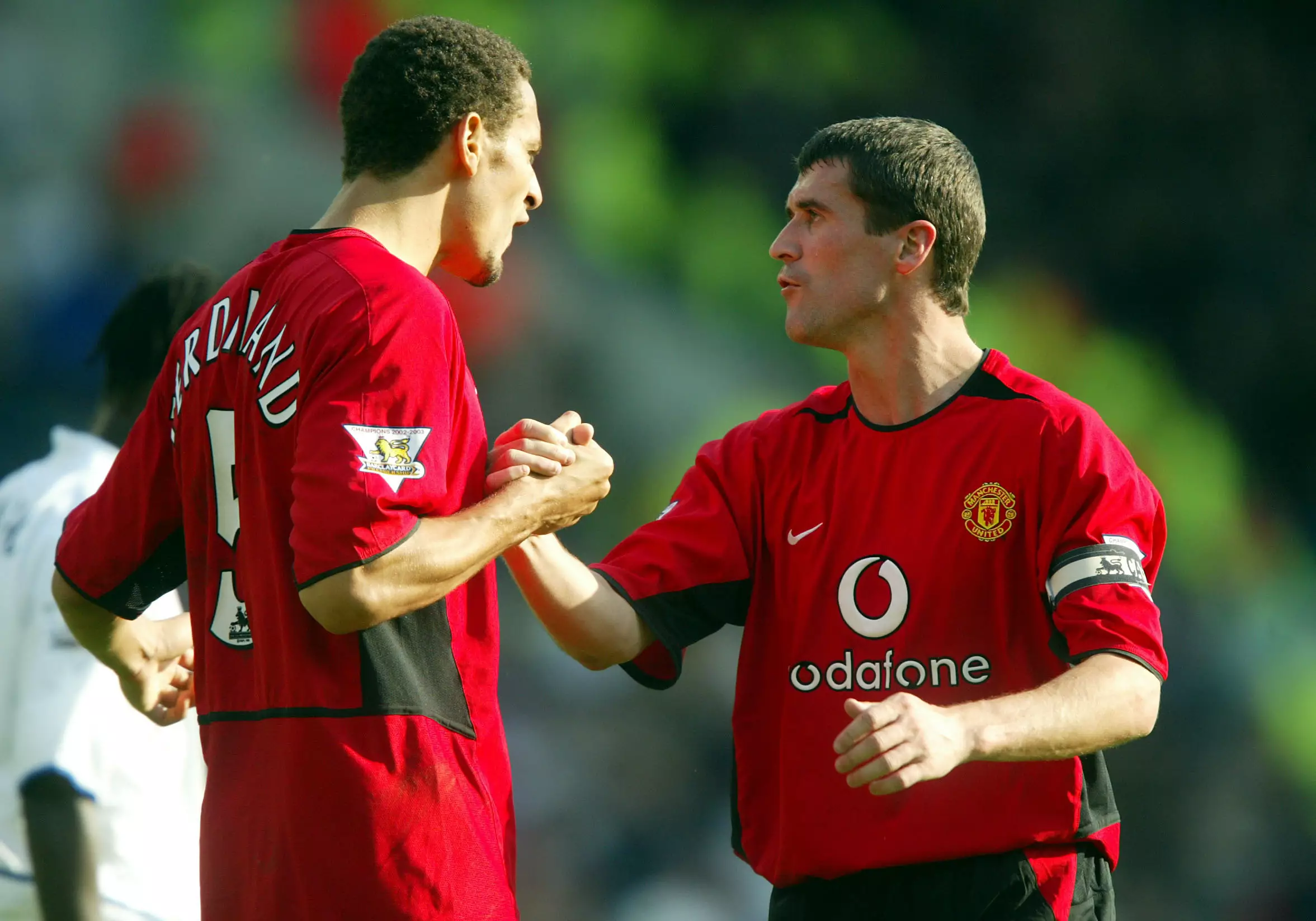 Ferdinand and Keane embrace. Image: PA