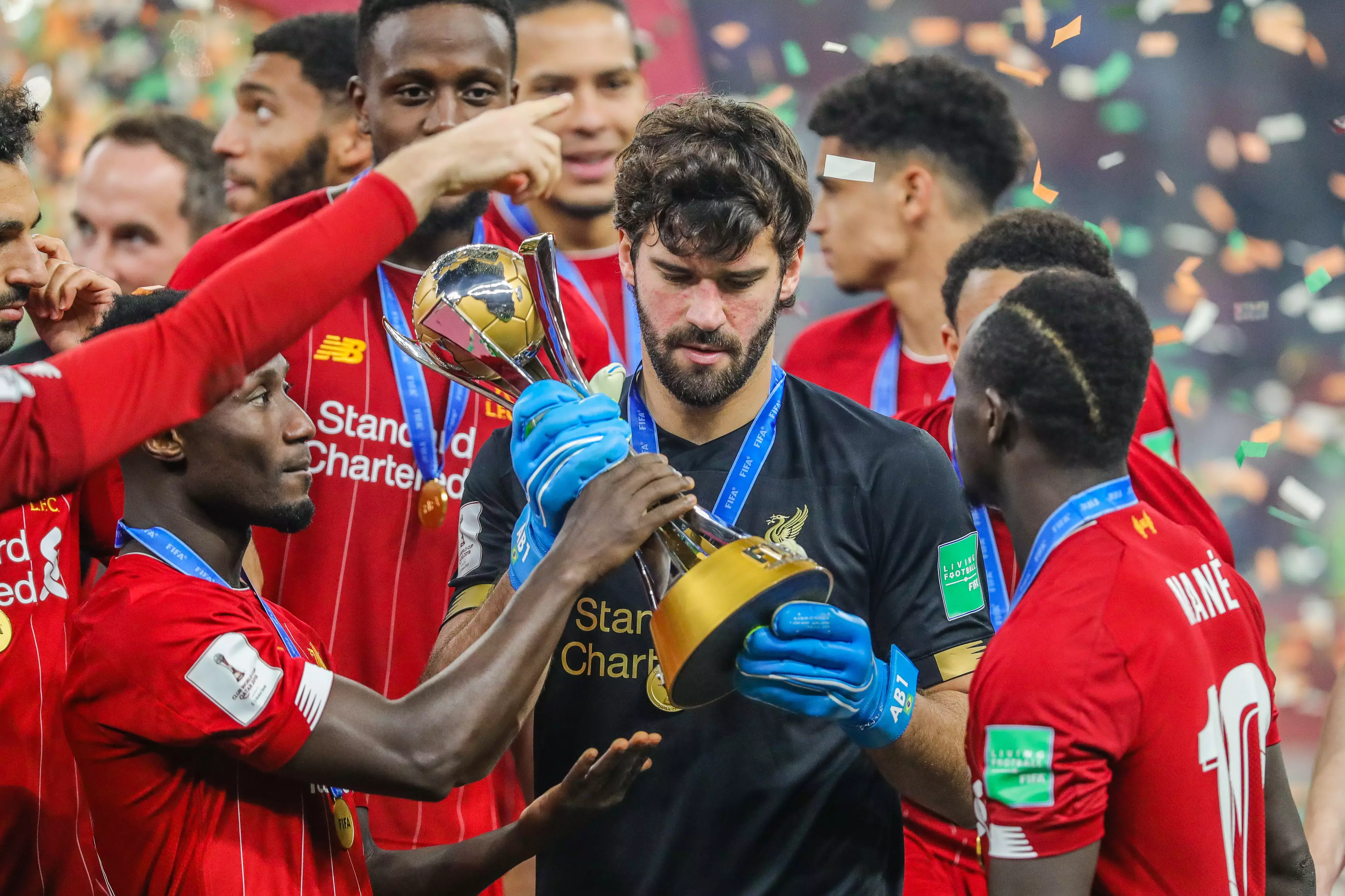 Alisson with the FIFA World Club Cup trophy. Image: PA Images