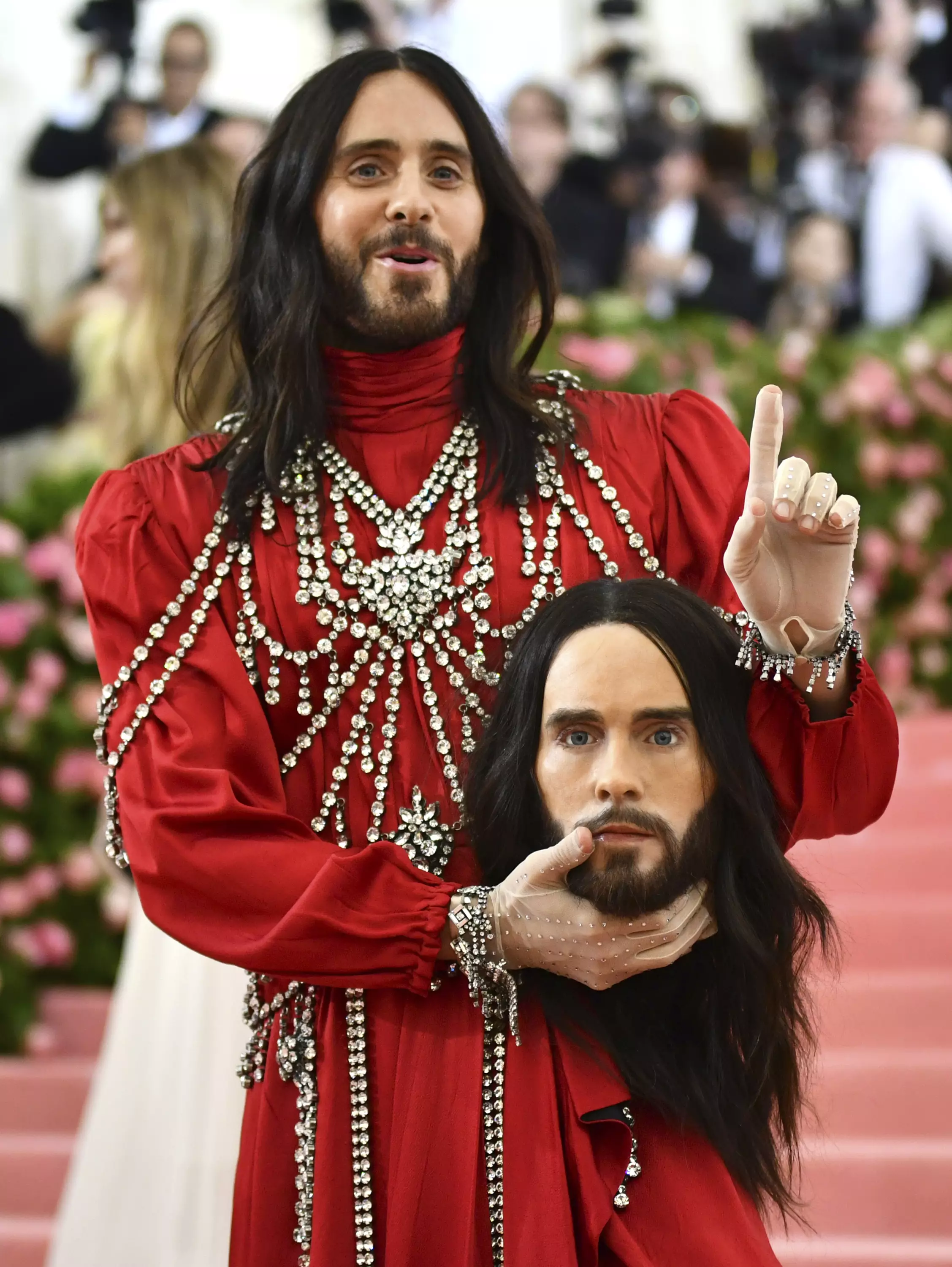 Jared Leto carried a prosthetic head down the red carpet.