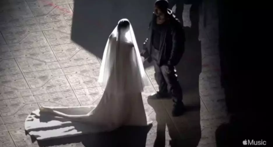Kim donned a couture Balenciaga wedding dress and veil (