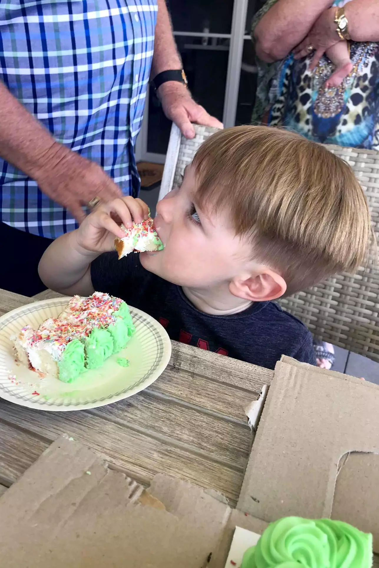 Little Mason enjoying his third birthday cake - if only he'd have known what it looked like hours earlier.