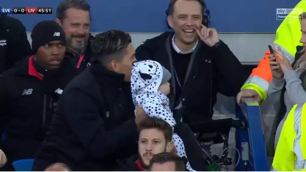 Roberto Firmino Poses For A Photo With Random Woman's Baby At Goodison Park