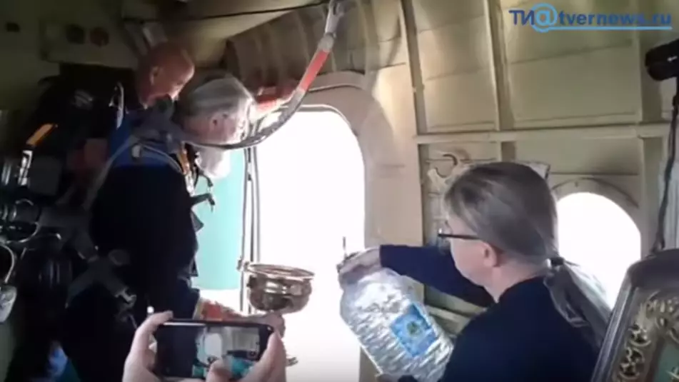 Priests Pour Holy Water Over City From Plane To Help Stop 'Fornication' and Substance Abuse