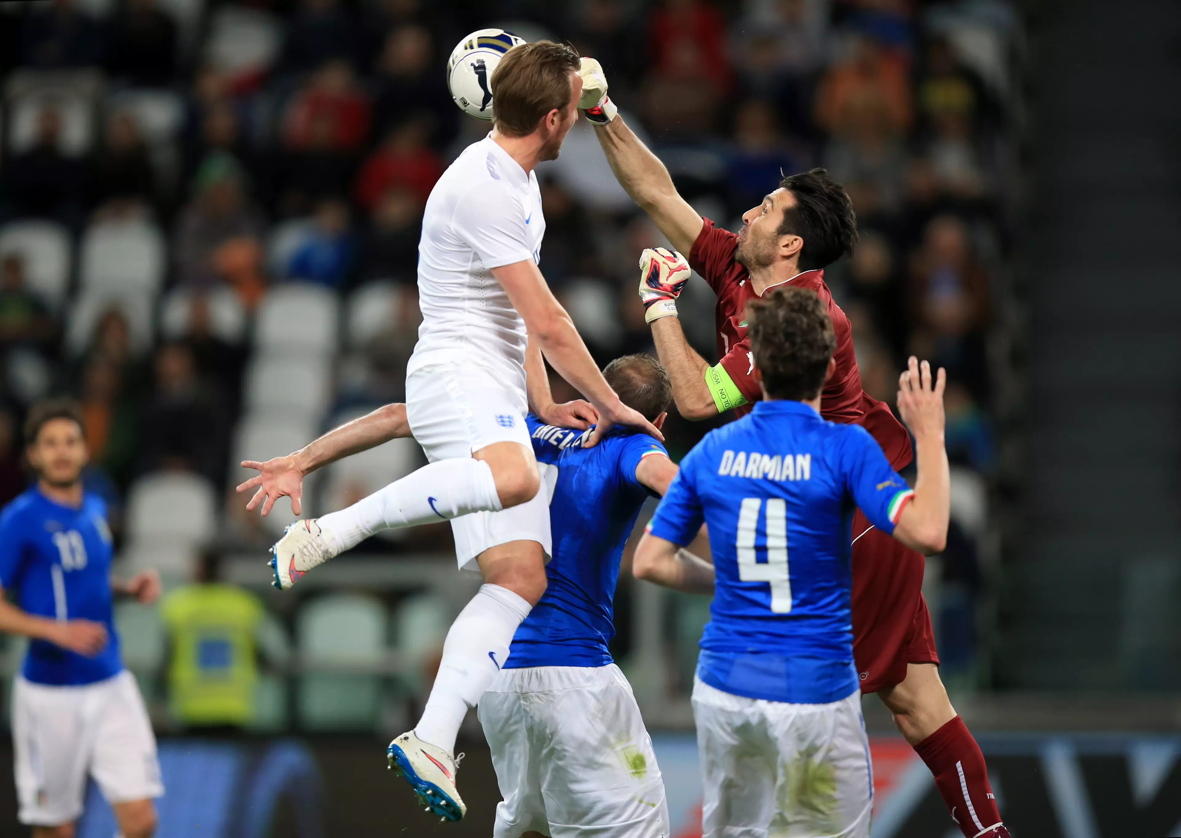 Kane rises above Chiellini on England debut. Image: PA Images.
