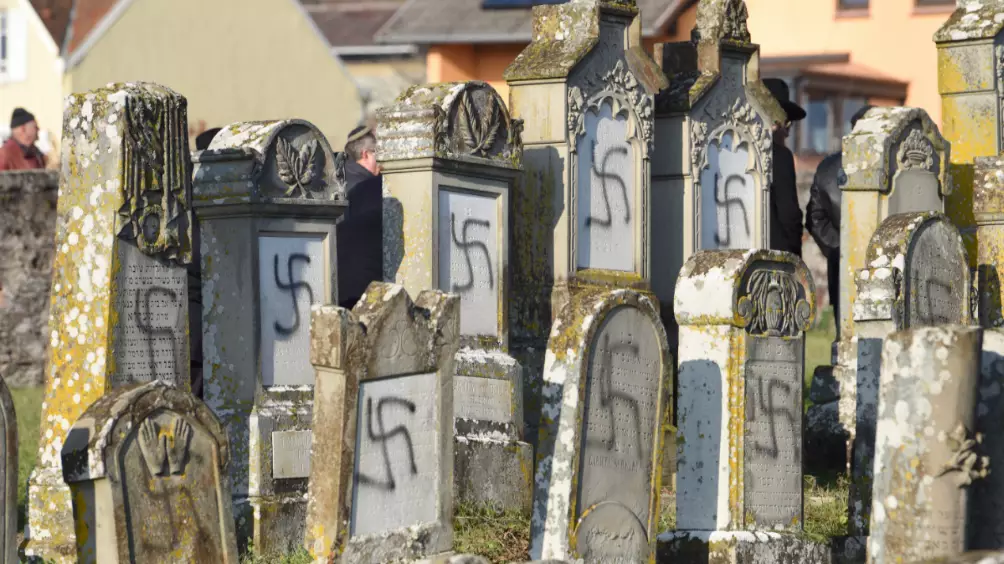 ​More Than 100 Jewish Graves Defaced With Swastikas In French Cemetery
